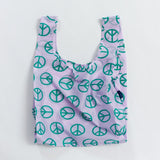 Shopper riutilizzabile lilla con simboli della pace verdi