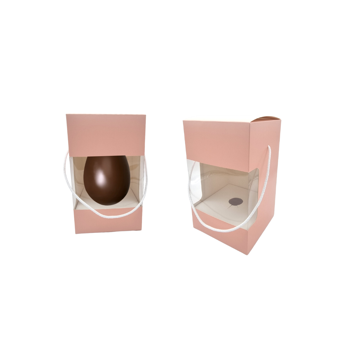 Scatola per uovo di Pasqua di cartone rosa con finestra e manico in cordoncino, una vuota ed una piena 