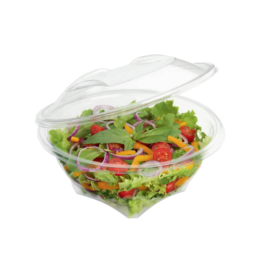 Ciotola di plastica ovale con coperchio attaccato piena di insalata