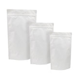 Tre buste, di diverse misure, bianche con zip