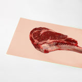Carta da macelleria cn sopra pezzo di carne 