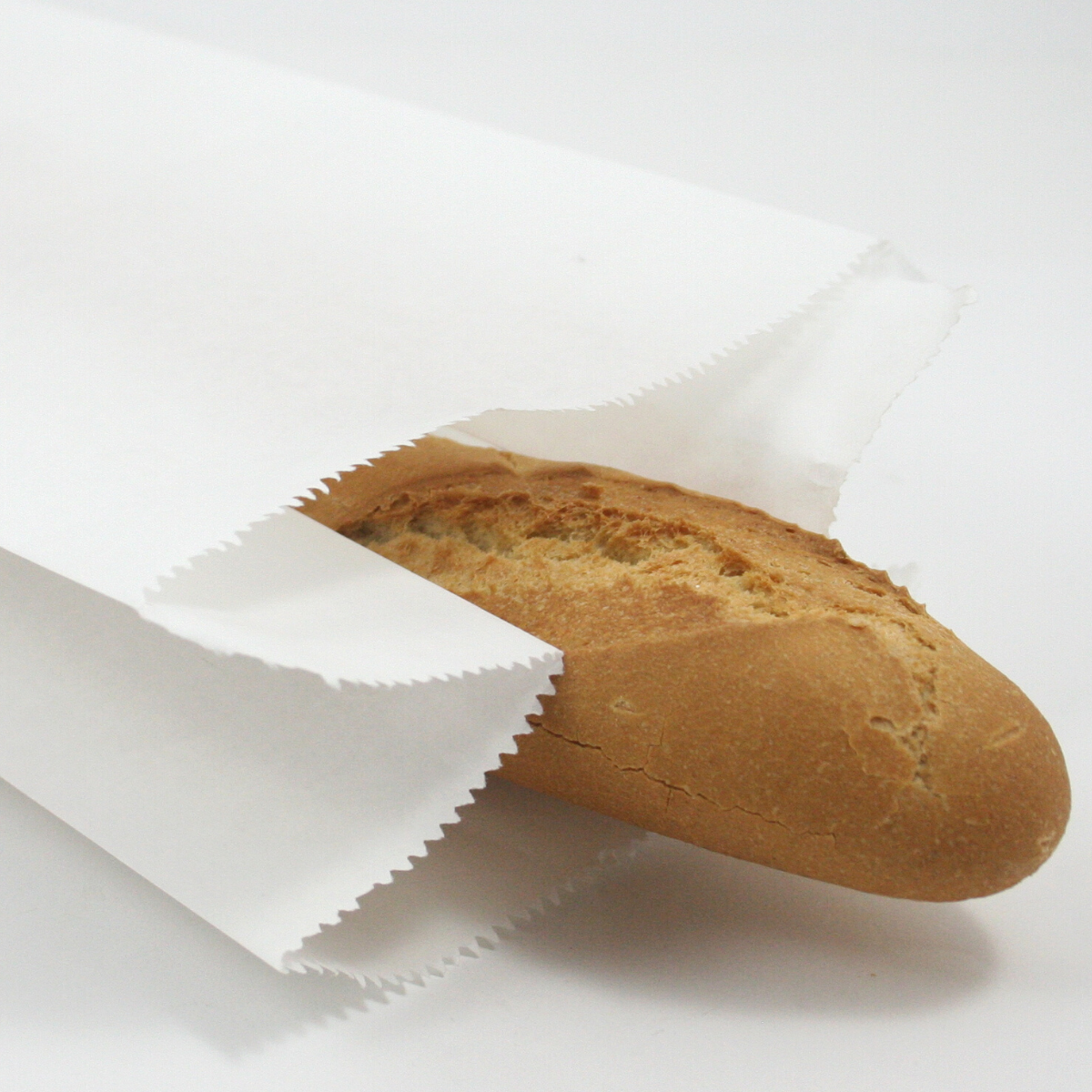 Dettaglio apertura busta di carta bianca con pane dentro