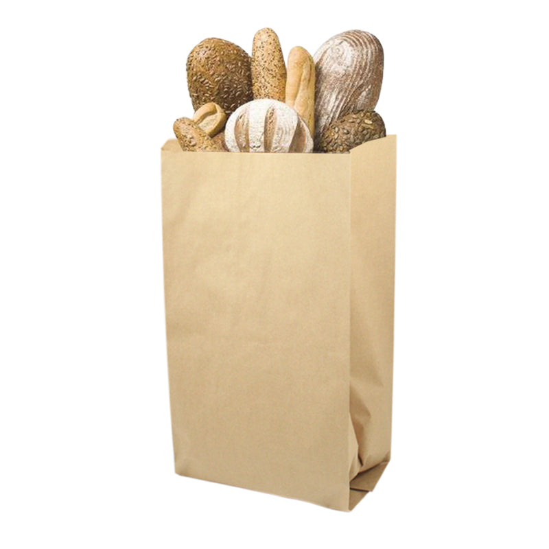 Sacchetto di carta color avana pieno di pane