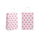 Due shopper di carta bianche con pois rosa