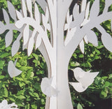 Dettaglio albero di carta con uccellini 
