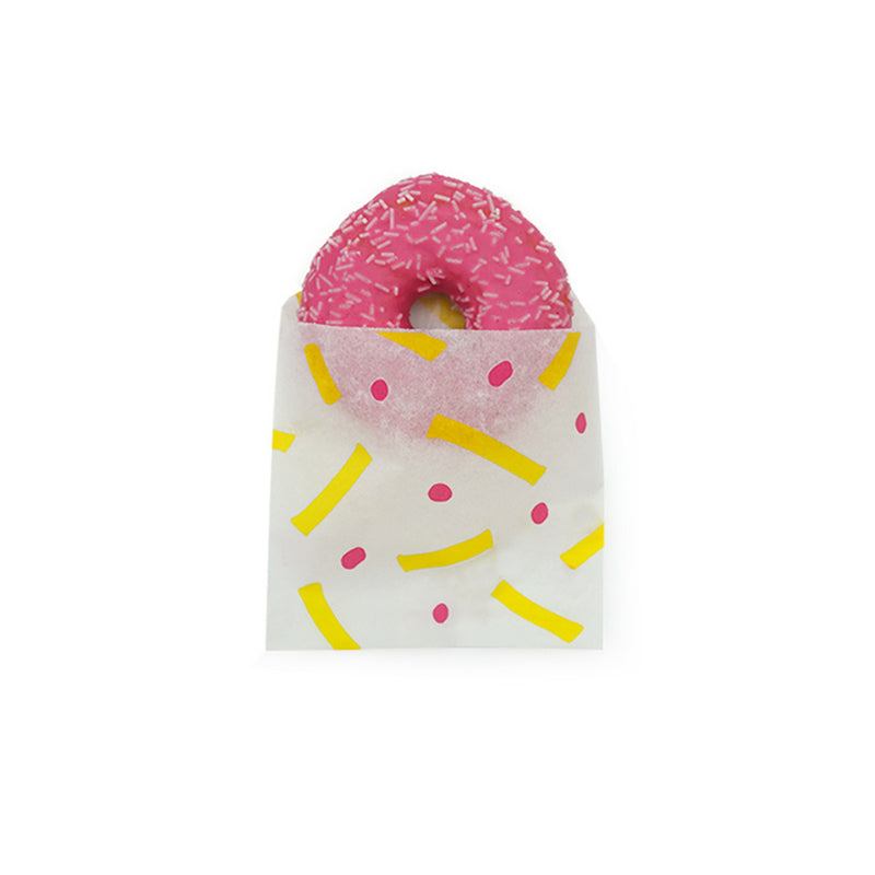 Sacchetto di carta antigrasso con dentro donuts rosa