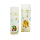 Sacchettini pasquali con finestra uno pieno di ovetti di cioccolato ed uno di pasta 