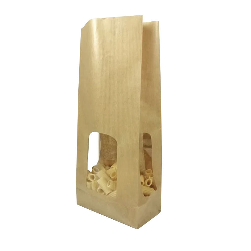 Sacchetto di carta con finestra pieno di pasta 