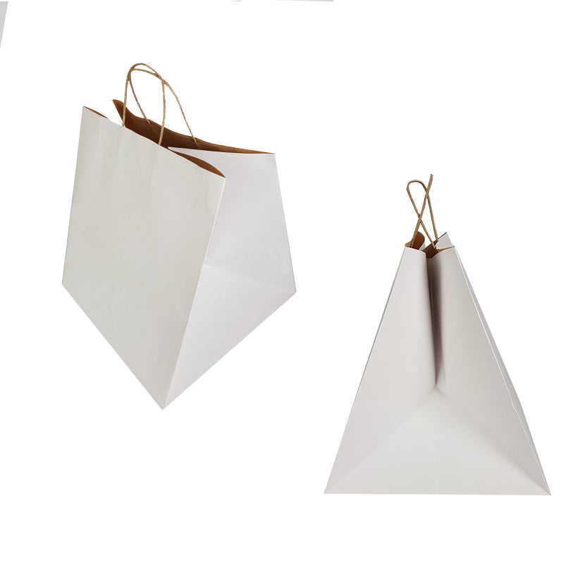 Shopper di carta bianche a fondo largo, diverse prospettive