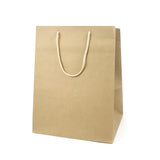 Shopper di carta con manico in cordoncino color avana