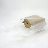 Shopper di plastica trasparente con dentro scatola porta hamburger color avana chiusa 